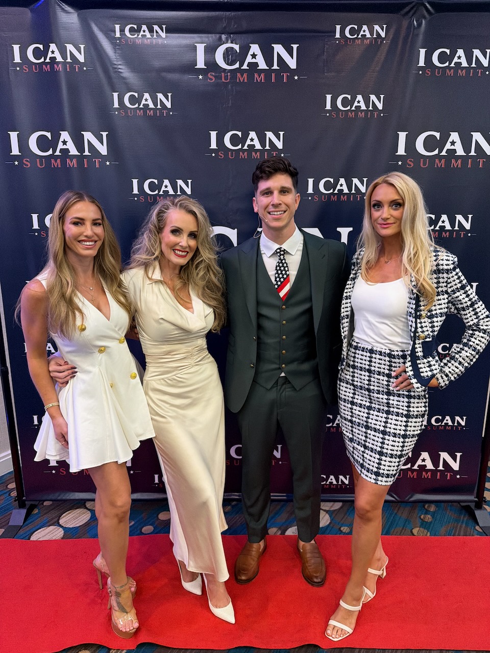 Luke and guests at the ICAN Summit photo wall